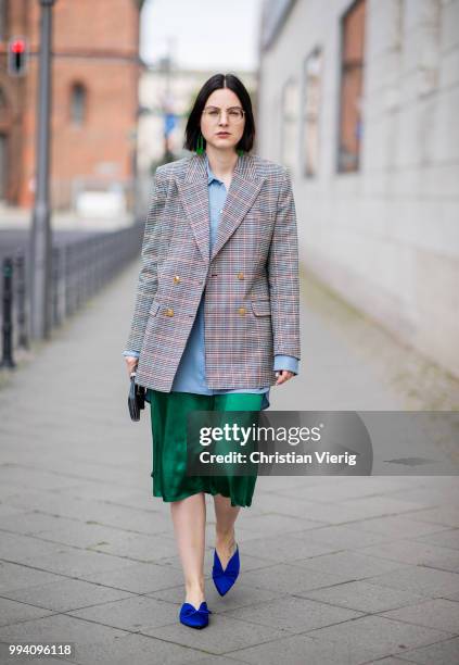 Maria Barteczko wearing checked blazer Essentiel Antwerp, blue oversized silk blouse Celine, green midi skirt Zara, blue pointy sliper Stradivarius,...