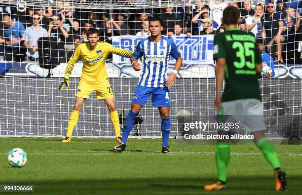 Hertha's goalkeeper Rune Jarstein and Karim Rekik during the German Bundesliga soccer match between Hertha BSC and Werder Bremen at the Olympia...