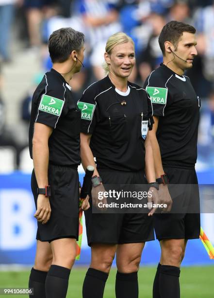 Referee Bibiana Steinhaus and her assistants Christof Guensch and Thomas Stein after the German Bundesliga soccer match between Hertha BSC and Werder...