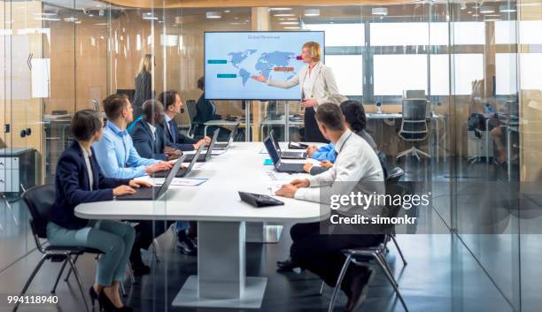 business people having meeting in conference room - business strategy map stock pictures, royalty-free photos & images