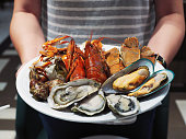 Plate of steamed crayfish, giant river prawn, mussel, giant crab and fresh oyster.