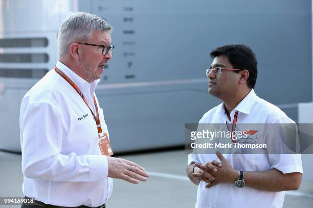 Ross Brawn, Managing Director of the Formula One Group talks with Mehul Kapadia, Global Head of Marketing for Tata Communications, during the launch...
