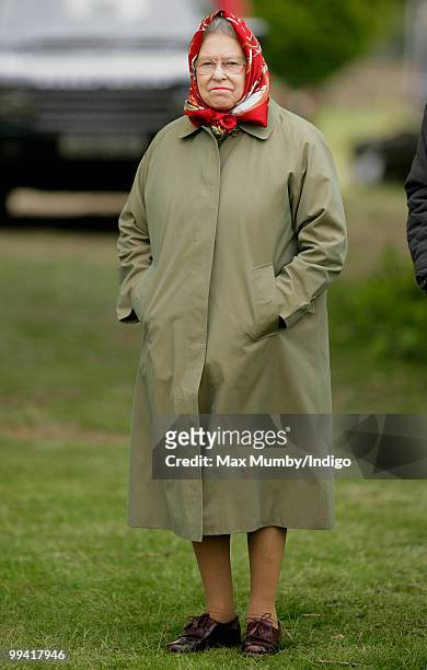Queen Elizabeth II watches her horse 'Stardust III' compete in the 'Ladies Side Saddle' class during day 3 of the Royal Windsor Horse Show on May 14,...