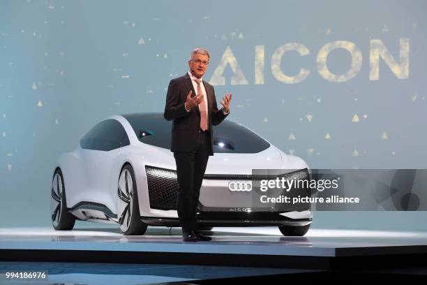 Rupert Stadler, CEO of Audi, presents the Audi Aicon, a fully autonomous upper class vehicle on the basis of the A8 without steering wheel, during a...