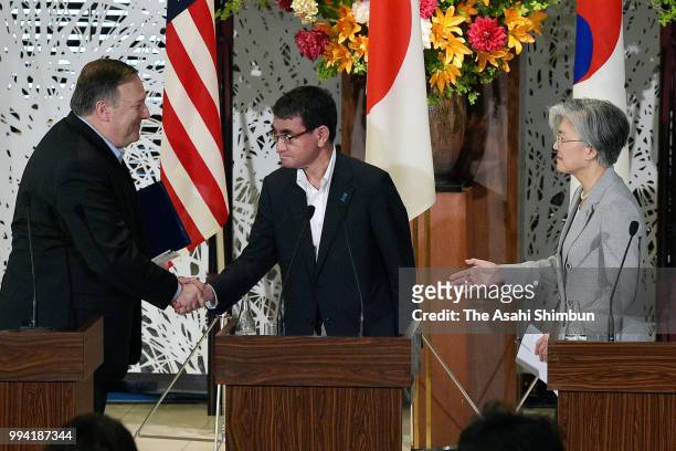 Secretary of State Mike Pompeo, South Korean Foreign Minister Kang Kyung-wha and Japanese Foreign Minister Taro Kono shake hands after a joint press...