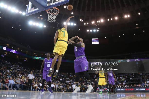 Josh Childress of Ball Hogs defends a shot by Carlos Boozer of Ghost Ballers during week three of the BIG3 three on three basketball league game at...