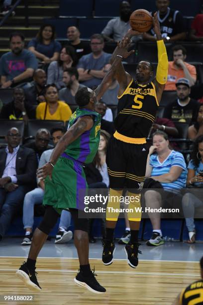 Stephen Jackson of Killer 3s takes a shot over Qyntel Woods of 3 Headed Monsters during week three of the BIG3 three on three basketball league game...