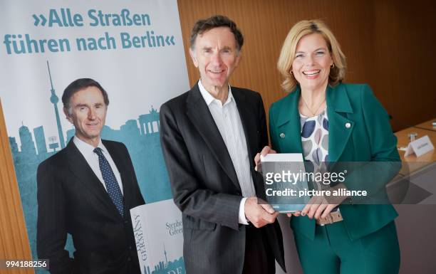 The Vice chairman of Germany's Christian Democratic Union , Julia Kloeckner, presents together with the writer and former British Minister of State...