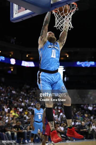 Chris Andersen of Power dunks the ball against Tri State during week three of the BIG3 three on three basketball league game at ORACLE Arena on July...