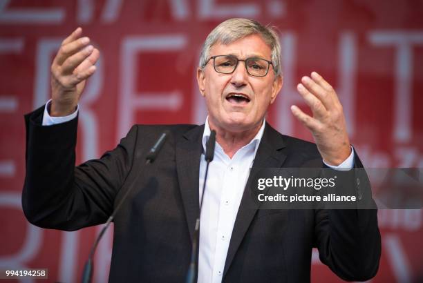 Bernd Riexinger, chairman of Die Linke party, speaks at an election campaign event of his party on the Castle Square in Stuttgart, Germany, 12...