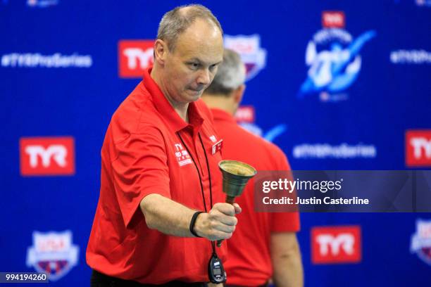 Meet official rings the bell lap for the men's 800m freestyle final at the 2018 TYR Pro Series on July 8, 2018 in Columbus, Ohio.