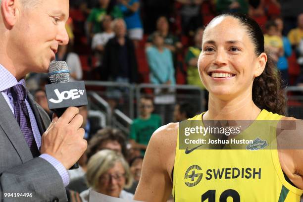 Sue Bird of the Seattle Storm speaks with the media after scoring her 6000th point against the Washington Mystics on July 8, 2018 at Key Arena in...