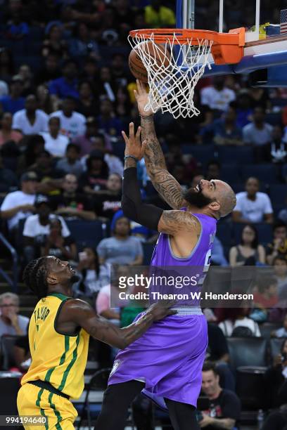 Carlos Boozer of Ghost Ballers throws up a shot against Jermaine Taylor of Ball Hogs during week three of the BIG3 three on three basketball league...