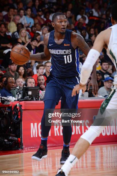 Dorian Finney-Smith of the Dallas Mavericks handles the ball during the game against the Milwaukee Bucks on July 8, 2018 at the Cox Pavilion in Las...