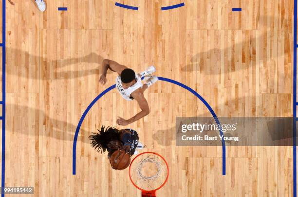 Johnathan Motley of the Dallas Mavericks drives to the basket during the game against the Milwaukee Bucks on July 8, 2018 at the Cox Pavilion in Las...