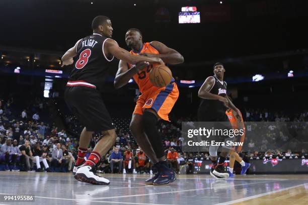 James White of Trilogy knocks the ball away from Jason Maxiell of 3's Company during week three of the BIG3 three on three basketball league game at...