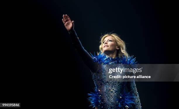 Singer Helene Fischer performs on stage during the start of her Germany tour at the Tui Arena in Hanover, Germany, 12 September 2017. Photo: Peter...