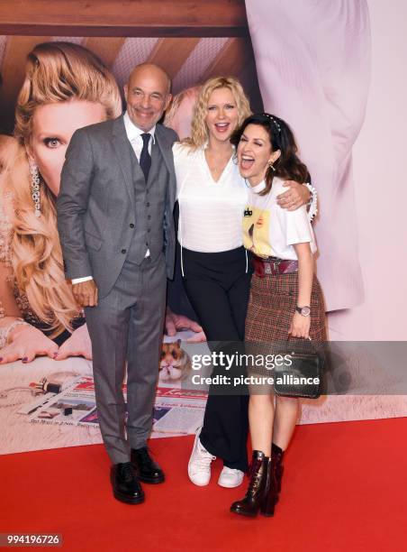 Actors Heiner Lauterbach, Veronica Ferres and Viktoria Lauterbach arrive at the movie premiere of 'Unter deutschen Betten' at the Mathaeser...