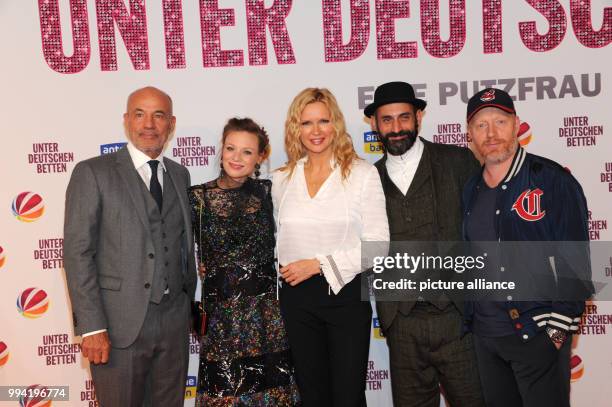 Actors Heiner Lauterbach , Magdalena Boczarska, Veronica Ferres, Eray Eglimez and Simon Schwarz arrive at the movie premiere of 'Unter deutschen...