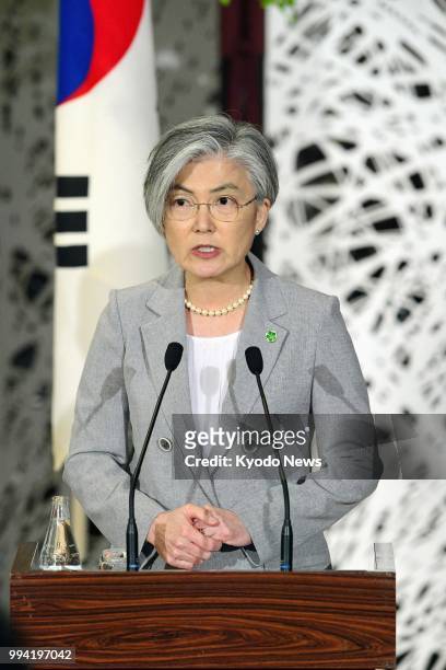 South Korean Foreign Minister Kang Kyung Wha speaks at a press conference after a trilateral meeting with her U.S. And Japanese counterparts in Tokyo...