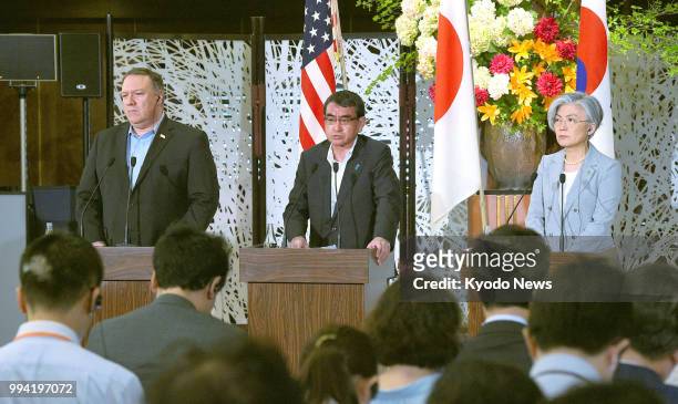 Secretary of State Mike Pompeo, Japanese Foreign Minister Taro Kono and South Korean Foreign Minister Kang Kyung Wha attend a press conference after...