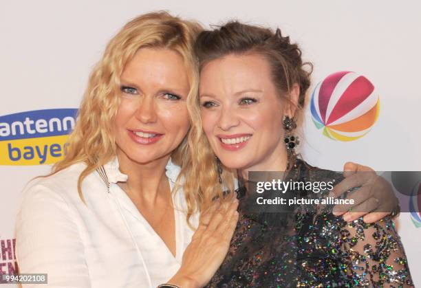 The actresses Veronica Ferres and Magdalena Boczarska attend the film premiere 'Unter deutschen Betten' at the Mathaeser Film Palace in Munich,...