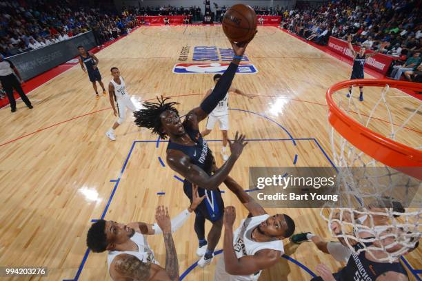 Johnathan Motley of the Dallas Mavericks drives to the basket during the game against the Milwaukee Bucks on July 8, 2018 at the Cox Pavilion in Las...