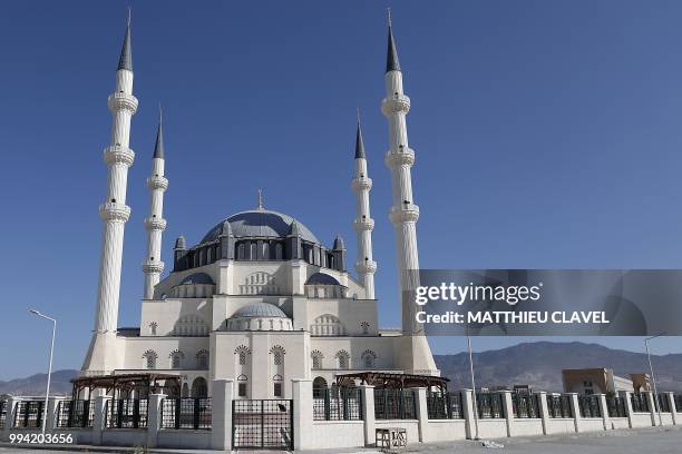 This picture shows the Hala sultan mosque in Haspolat , in the self-proclaimed Turkish Republic of Northern Cyprus , on July 5, 2018. - In the flat...