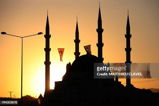This picture shows the Hala sultan mosque in Haspolat , in the self-proclaimed Turkish Republic of Northern Cyprus , on July 7, 2018. - In the flat...