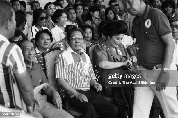 Incumbent President Ferdinand Marcos and his wife Imelda attend a campaign rally on January 4, 1986 in San Pablo, Laguna, Philippines.