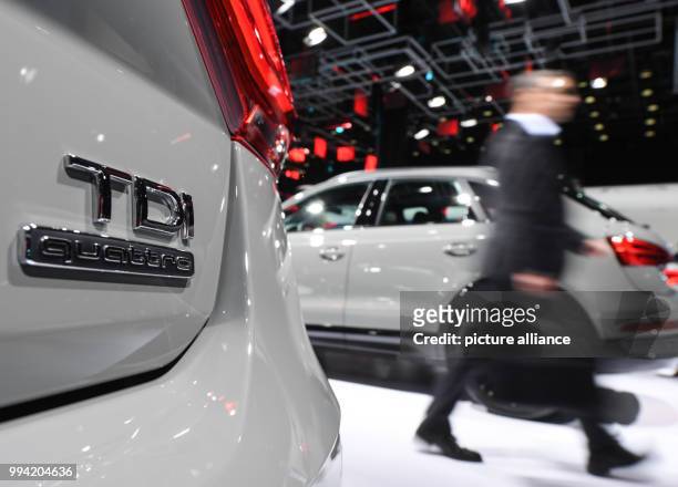 The lettering 'TDI quattro' can be read on a Audi Q2 at the Audi stand at the Internationale Automobil-Ausstellung in Frankfurt am Main, Germany, 12...