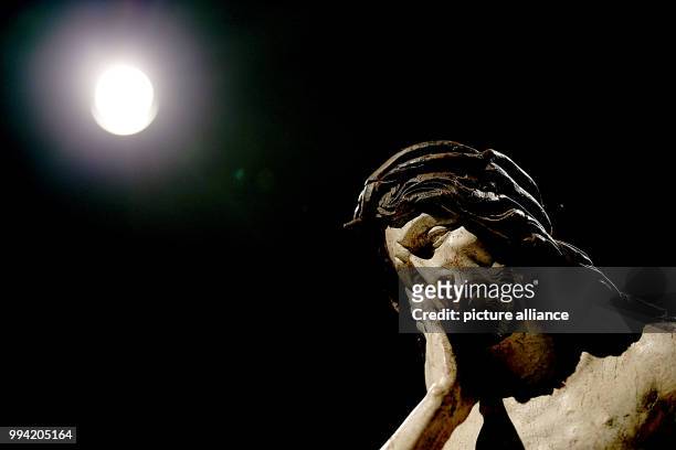 The sculpture 'Christus in der Rast' can be seen underneath a spotlight at the Kolumba Museum in Cologne, Germany, 13 September 2017. Once a year the...
