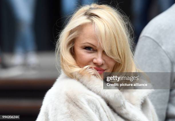 The actress Pamela Anderson can be seen during a photo call at the presentation of Klok's 'House of Mystery' tour in Cologne, Germany, 13 September...