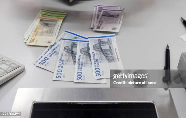 Danish Krone can be seen at a exchange office in Munich, Germany, 13 September 2017. President of the European Commission Juncker wants to introduce...