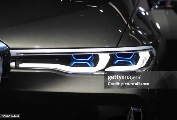 The spotlights of the BMW Concept X7 iPerformance can be seen at the Internationale Automobil-Ausstellung in Frankfurt am Main, Germany, 13 September...