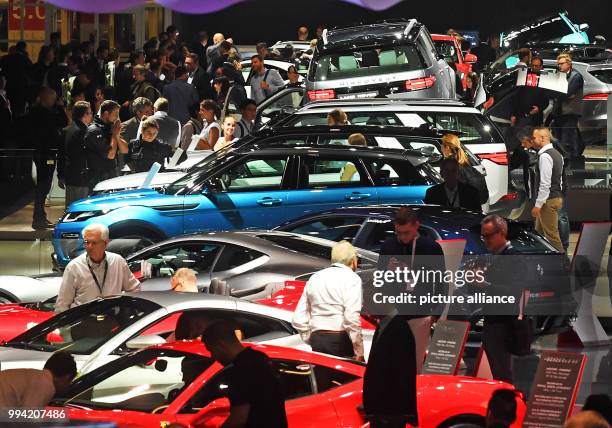 Hall overview shows Jaguar, Land Rover and Ferrari at the Internationale Automobil-Ausstellung in Frankfurt am Main, Germany, 13 September 2017. From...