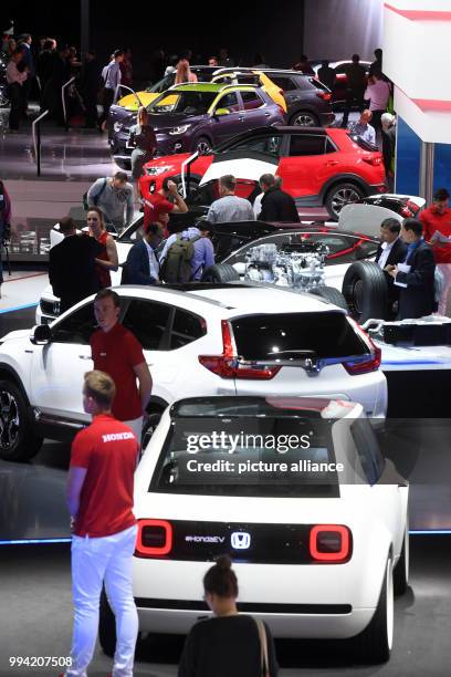 The Honda and Kia stands can be seen at the Internationale Automobil-Ausstellung in Frankfurt am Main, Germany, 13 September 2017. From 14-24...