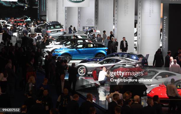 General view of a hall at the International Motor Show , shows Jaguar, Land Rover and Ferrari on display in Frankfurt am Main, Germany, 13 September...