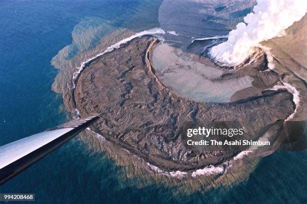 In this aerial image, submarine volcano Fukutoku Okanoba erupts, forming a new island near Minami Iwojima Island on January 20, 1986 in Ogasawara,...