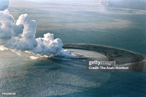 In this aerial image, submarine volcano Fukutoku Okanoba erupts, forming a new island near Minami Iwojima Island on January 20, 1986 in Ogasawara,...