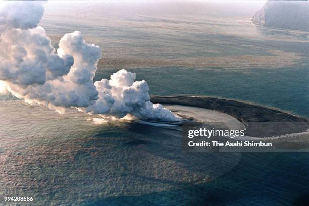 In this aerial image, submarine volcano Fukutoku Okanoba erupts, forming a new island near Minami Iwojima Island on January 20, 1986 in Ogasawara,...