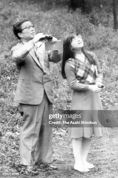 Princess Sayako does birdwatching at the Akasaka Imperial Garden ahead of her 17th birthday on April 1, 1986 in Tokyo, Japan.