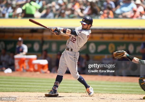 Josh Reddick of the Houston Astros bats against the Oakland Athletics at Oakland Alameda Coliseum on June 14, 2018 in Oakland, California.