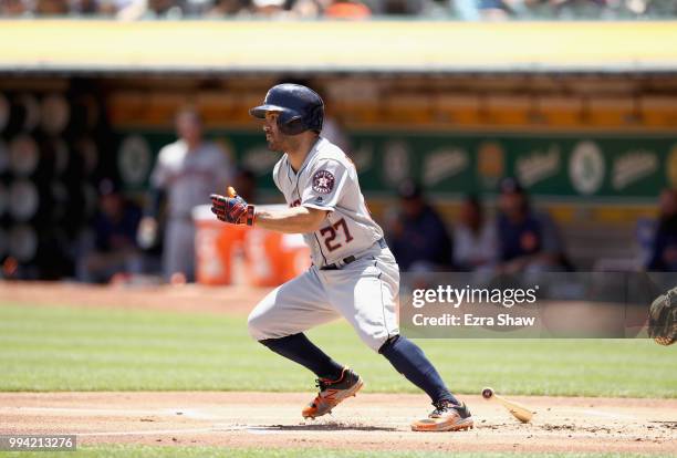 Jose Altuve of the Houston Astros bats against the Oakland Athletics at Oakland Alameda Coliseum on June 14, 2018 in Oakland, California.