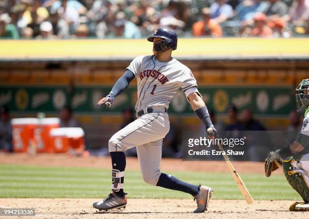 Carlos Correa of the Houston Astros bats against the Oakland Athletics at Oakland Alameda Coliseum on June 14, 2018 in Oakland, California.