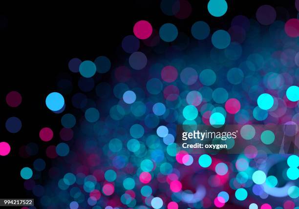 abstract pink and blue spotted bokeh background - christmas bokeh ストックフォトと画像