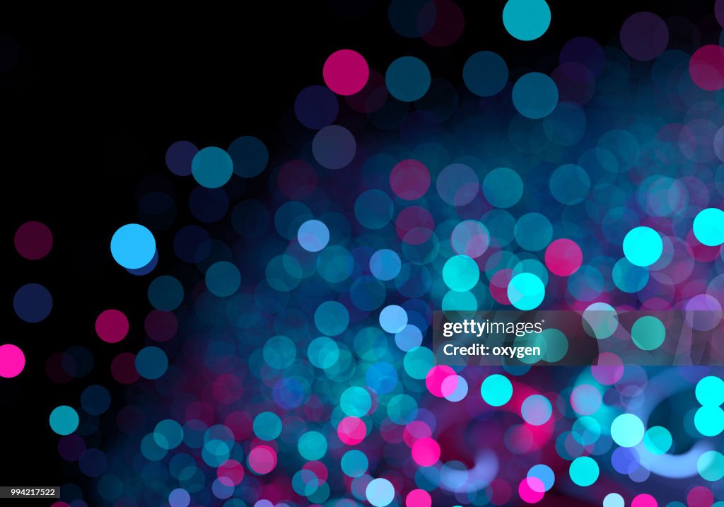 Abstract pink and blue spotted bokeh background