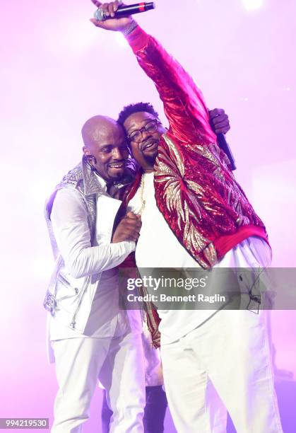 Teddy Riley and Dave Hollister perform onstage during the 2018 Essence Festival presented by Coca-Cola - Day 3 at Louisiana Superdome on July 7, 2018...