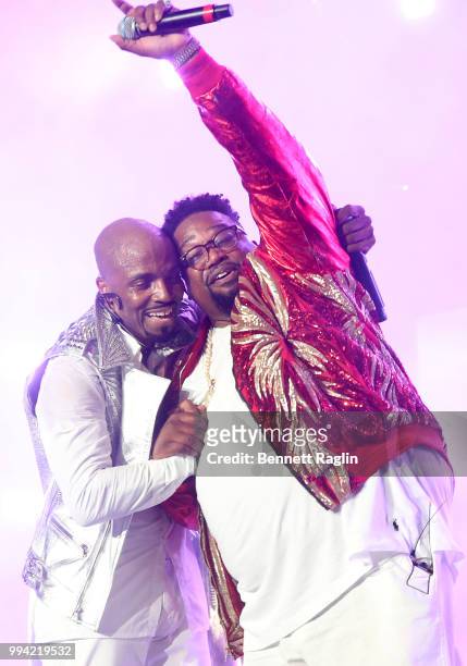 Teddy Riley and Dave Hollister perform onstage during the 2018 Essence Festival presented by Coca-Cola - Day 3 at Louisiana Superdome on July 7, 2018...