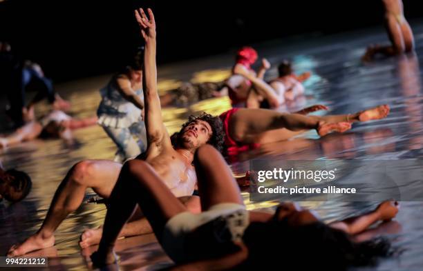Dancers from the Ensembles Musée de la Danse rehearse Boris Charmatz's piece 'A Dancer's Day - 10000 Gestures' in Hangar 5 of the defunct Tempelhof...
